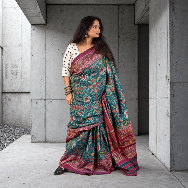 KUNJAR  BHAT CASTLETON GREEN-WINE RED SINGLE IKAT COTTON PATOLA SAREE