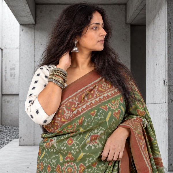 KUNJAR BHAT FERN GREEN-TERRACOTTA SINGLE IKAT COTTON PATOLA SAREE