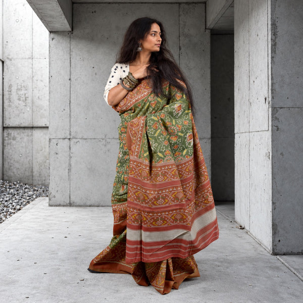 KUNJAR BHAT FERN GREEN-TERRACOTTA SINGLE IKAT COTTON PATOLA SAREE