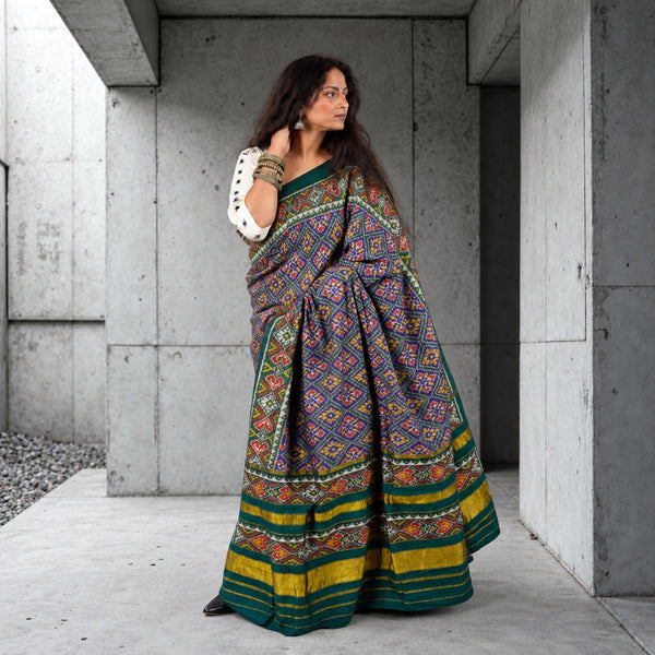 RATAN CHOK ROYAL INDIGO-SACRAMENTO GREEN SINGLE IKAT COTTON PATOLA SAREE WITH ZARI ANCHAL