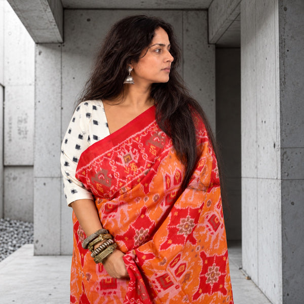 KUNJAR BHAT RASPBERRY RED-APRICOT ORANGE SINGLE IKAT COTTON PATOLA SAREE