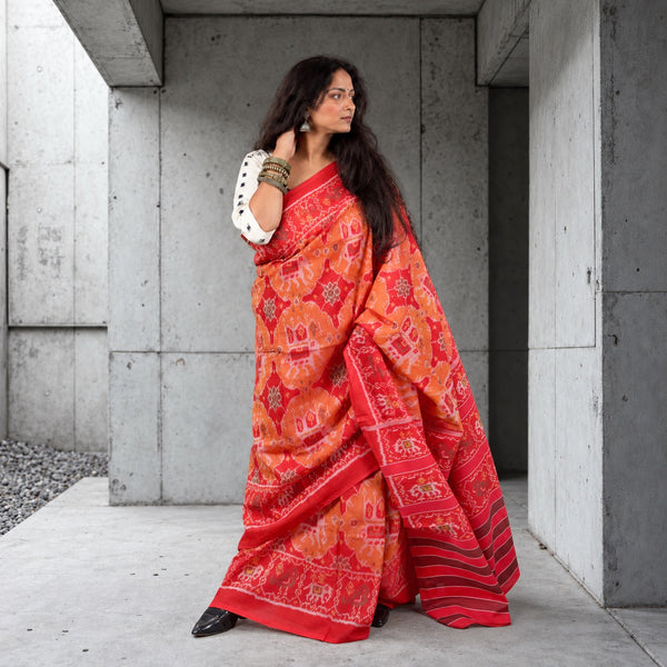 KUNJAR BHAT RASPBERRY RED-APRICOT ORANGE SINGLE IKAT COTTON PATOLA SAREE